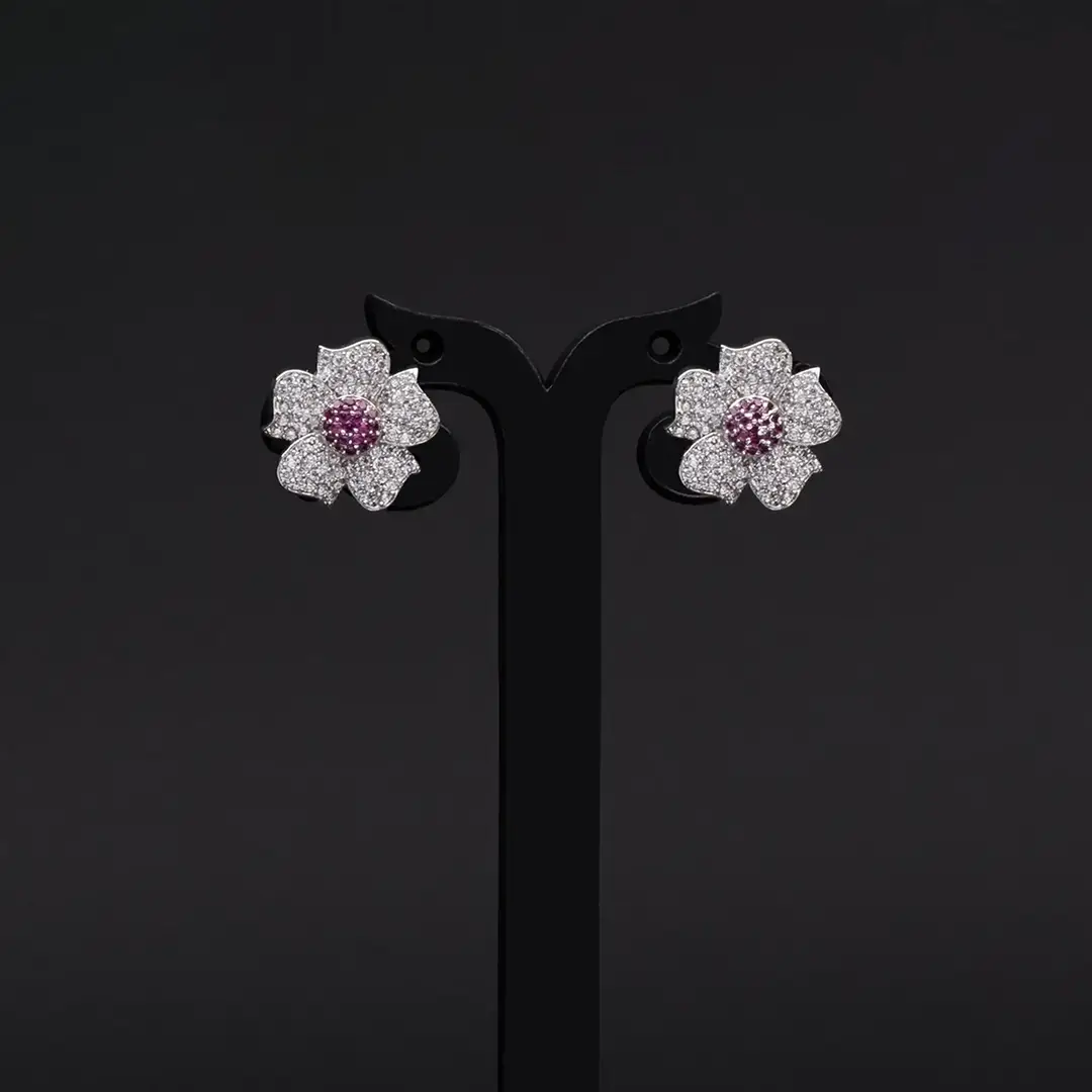 Floral Design adorned with American Diamond and Hint of Pink Stones with Rhodium-Plating