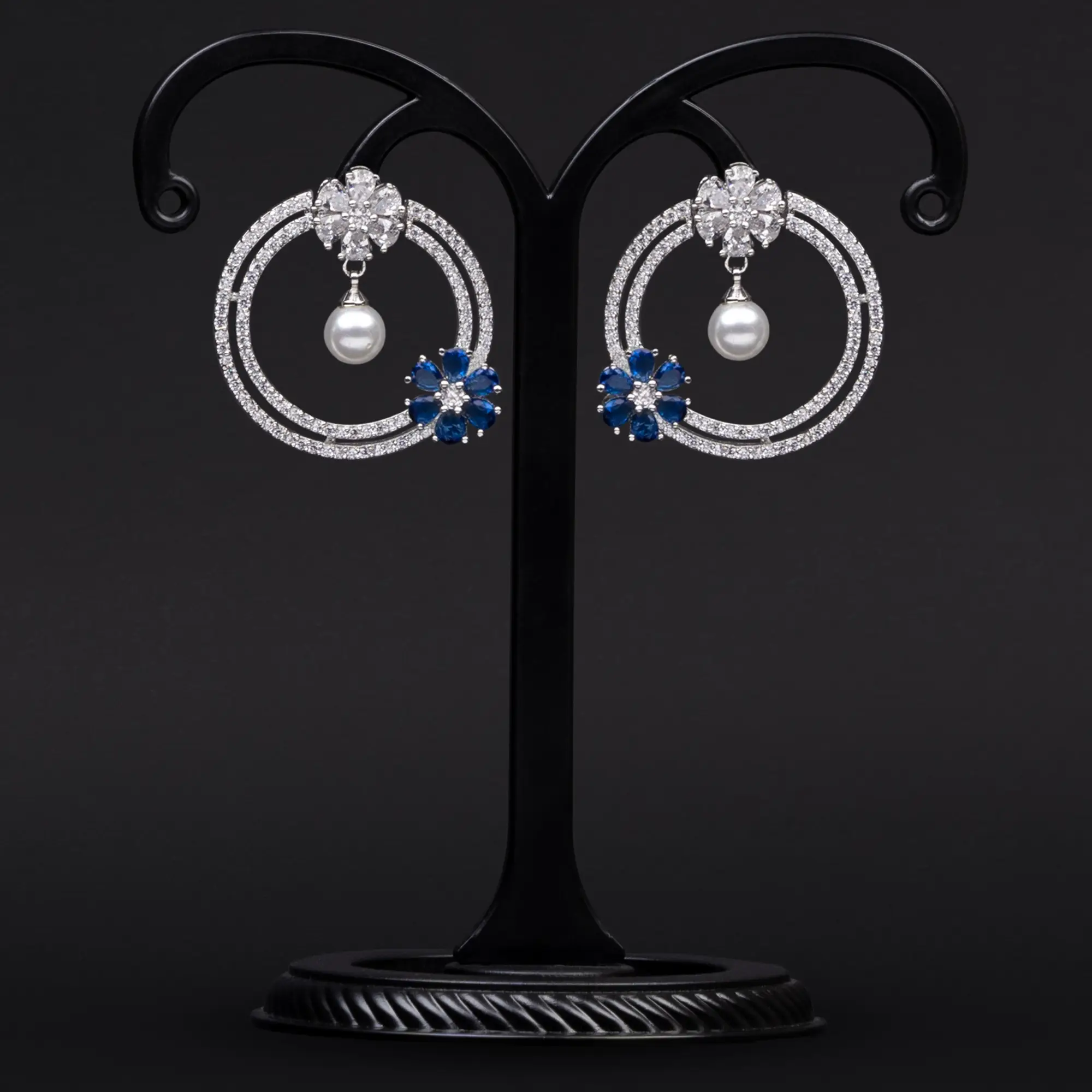 Circles of American Diamonds with Floral Motifs in Blue Stone and White Pearl Earrings