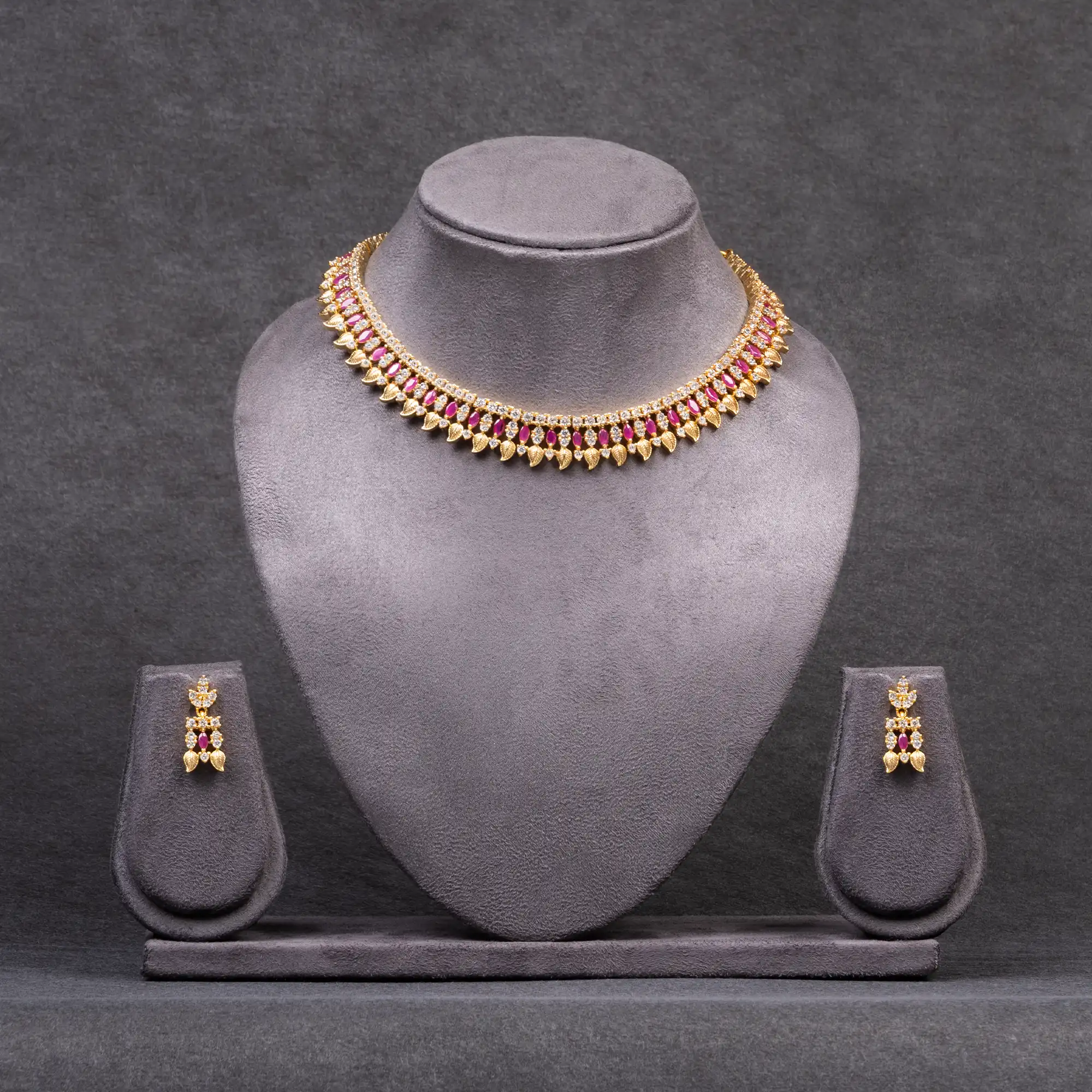 Gold-Plated Set in American Diamond, Ruby Red Stones and Gold Motifs Necklace and Earrings